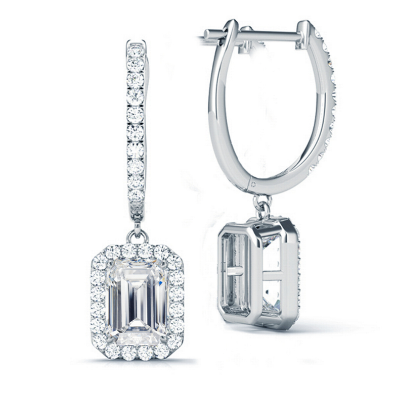 Diamond Drop Earrings. Emerald Cut Diamond with a Diamond Halo Surrounding the center stone. Set in White Gold. Made by Diamond and Gold Warehouse. 