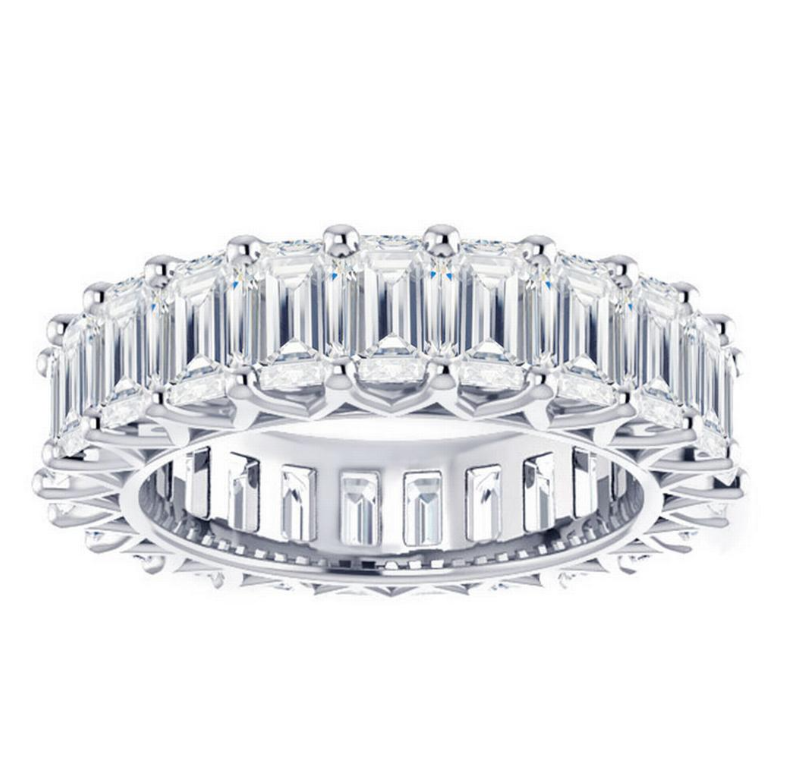 Eternity Ring. Emerald Cut Diamonds set in a Gold Ring. Diamonds go around the whole base. Made by Diamond and Gold Warehouse. Holiday Gift Guide